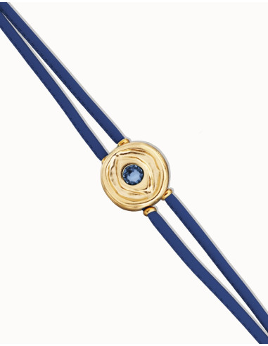 Pulsera de cuero azul con ojo dorado...