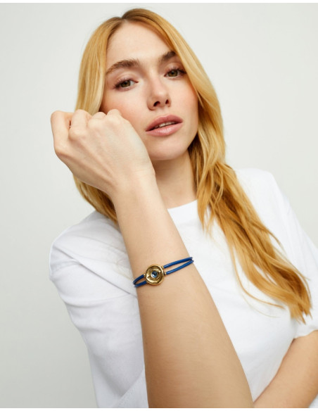 Pulsera de cuero azul con ojo dorado UNOde50