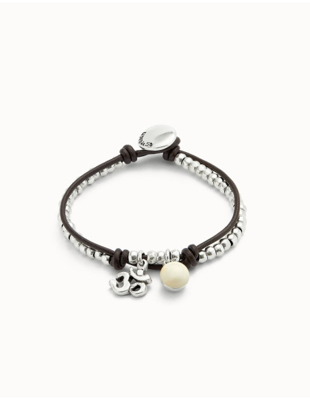 Pulsera simbolo Om con cristal de murano marfil UNOde50