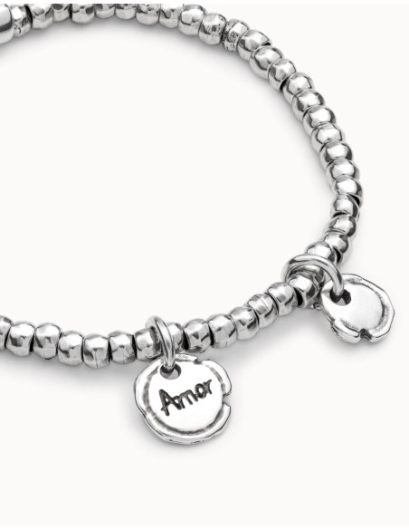 Pulsera de bolitas con charms UNOde50